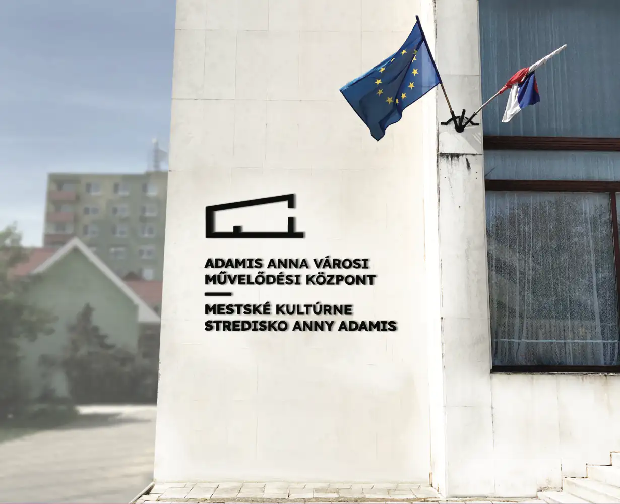 The mark and bilingual wordmark applied to the cultural centre's facade