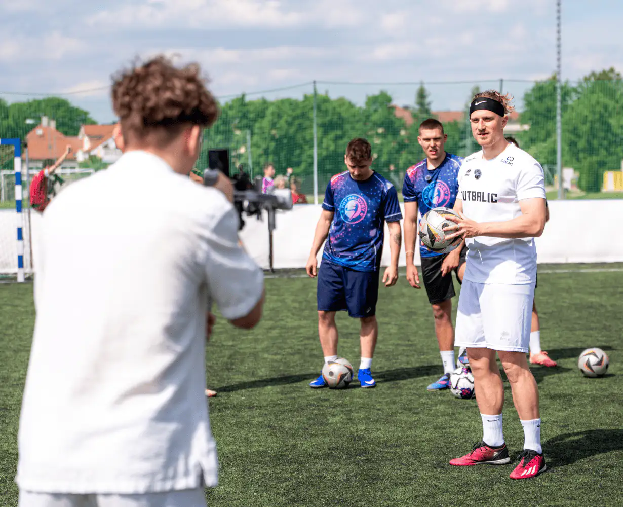 Filming the players on the pitch