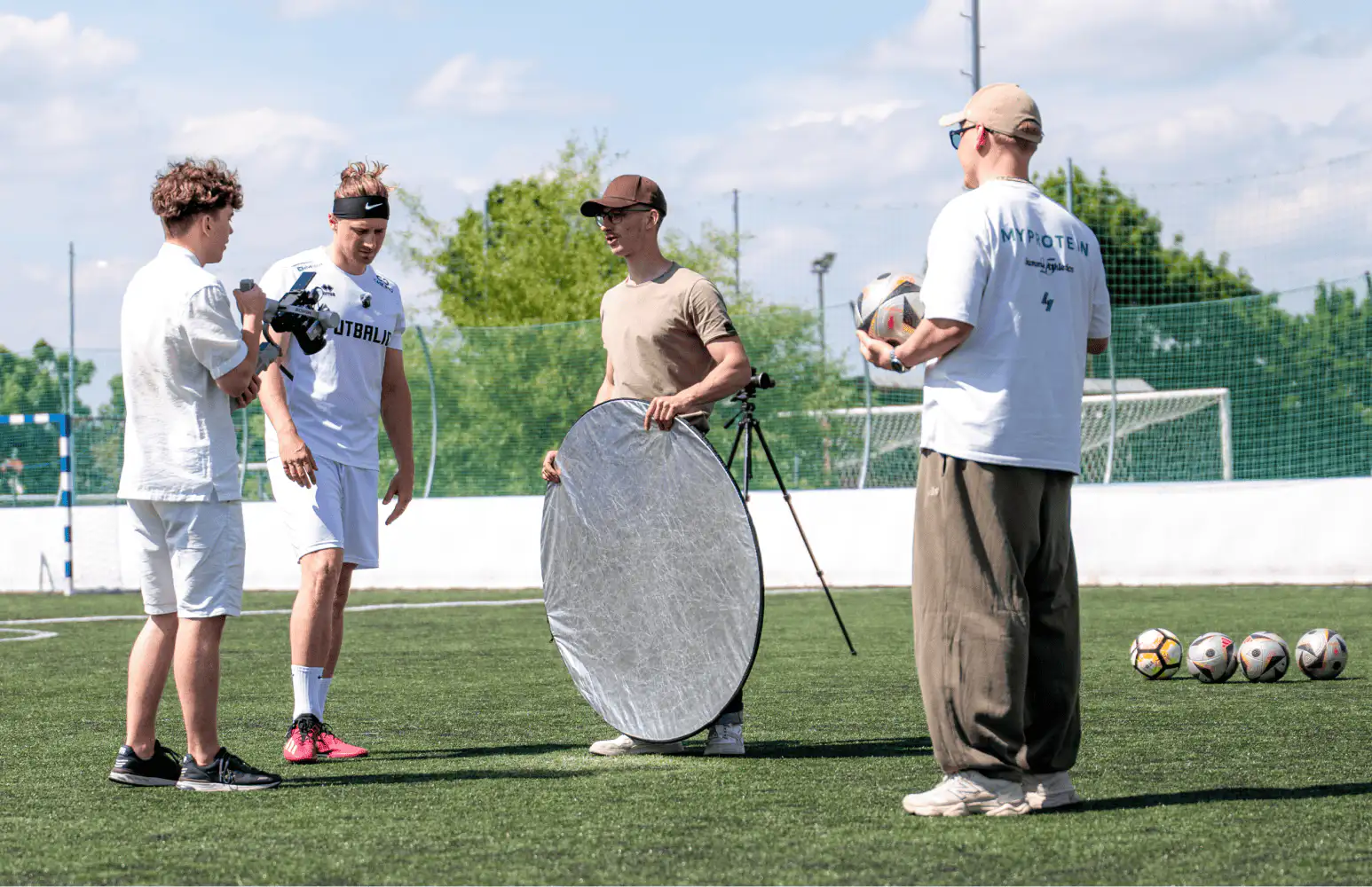 Our crew lining up a shot with a player during the FUTBALIC shoot